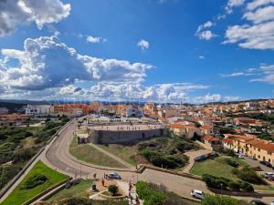 an aerial view of a city with buildings and a street at Casa Lorenza a 300 m dalla spiaggia Rena Bianca in Santa Teresa Gallura