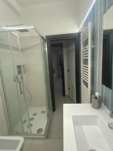 a bathroom with a shower and a sink at Vatican Paradise Pisana 43 in Rome
