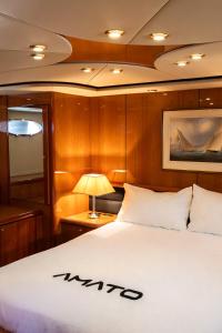 a bedroom on a boat with a bed at Luxury Yacht "Amato" in Sanremo