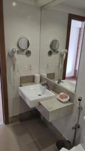 Ένα μπάνιο στο Vista Azul Apartamento - hospedagem nas montanhas