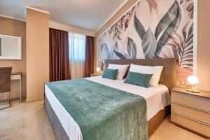 Postel nebo postele na pokoji v ubytování Villa Astrid***** + 31 fotografií