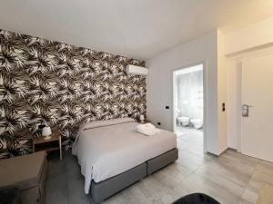 Кровать или кровати в номере Pinea b&b