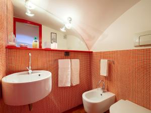 Un baño de Sweet Home Colosseo 12 fotos más