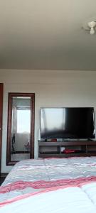 Et tv og/eller underholdning på Cozy Room - Margot Arimborgo