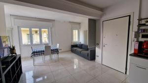 a living room with a couch and a table at LG colosseum Rome apartment in Rome