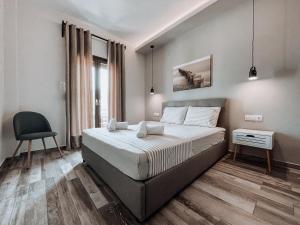 Postel nebo postele na pokoji v ubytování Hotel Eleni