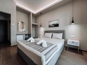 Postel nebo postele na pokoji v ubytování Hotel Eleni + 33 fotografií