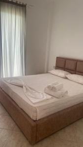 Postel nebo postele na pokoji v ubytování Hotel Dini