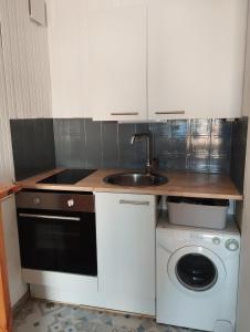 Kuchyňa alebo kuchynka v ubytovaní Appartement vue mer Le Barcarès