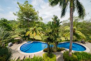 Bazén v ubytování Los Suenos Veranda 3G by Stay in CR nebo v jeho okolí