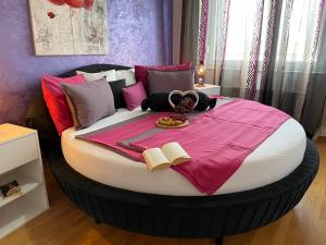 A bed or beds in a room at Ella Apartman Zagreb
