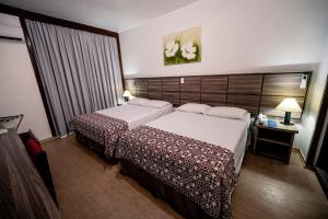 Cama ou camas em um quarto em Hotel Dan Inn Planalto São Paulo