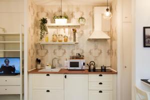 A kitchen or kitchenette at St. Peter Sweets