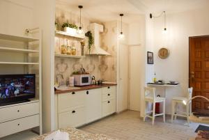 A kitchen or kitchenette at St. Peter Sweets