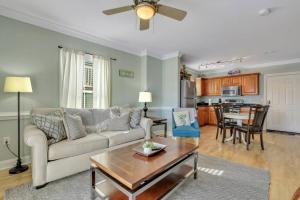 a living room with a couch and a table at 2 Bed Condo Walk to the Beach in Tybee Island