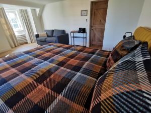 Postel nebo postele na pokoji v ubytování B&B Lili's Tuin
