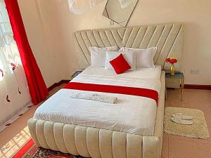 Giường trong phòng chung tại Homely apt 3 (three)