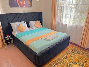Giường trong phòng chung tại Homely apt 3 (three)