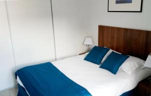 Postel nebo postele na pokoji v ubytování Appart Hotel Odalys City Amiens Blamont