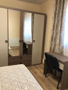 Postel nebo postele na pokoji v ubytování Apartament Confortabil, Luminos + 1 fotografie