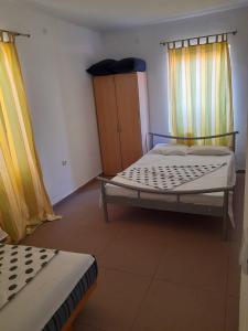 Un pat sau paturi într-o cameră la Appartment Utjeha