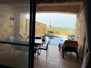 Φωτογραφία από το άλμπουμ του Islandlife Farmhouse with view Ta'Pitra σε Xagħra