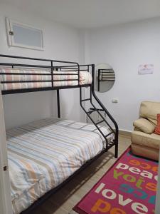 Ένα ή περισσότερα κρεβάτια σε δωμάτιο στο Apartamento en el casco viejo de Castro Urdiales