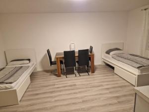 Ένα ή περισσότερα κρεβάτια σε δωμάτιο στο Ferienwohnung Sumi