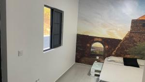 Mynd úr myndasafni af Palmira House í Cidade Velha