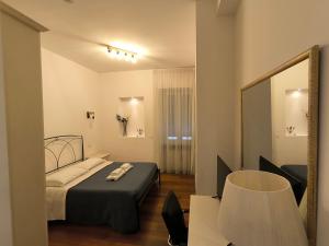 A bed or beds in a room at Tre R