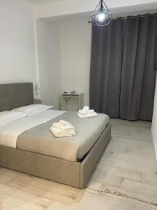 Postel nebo postele na pokoji v ubytování Maison appartaments + 37 fotografií