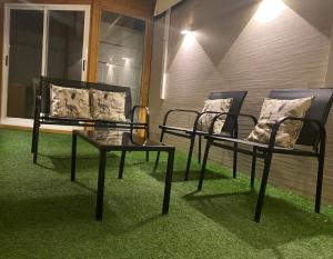 Posezení v ubytování Bonito Apartamento con wifi y patio