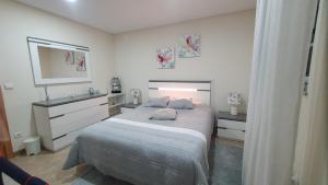 Giường trong phòng chung tại apartamento T2 zona rural