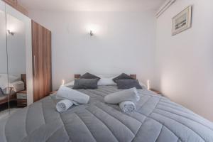 Posteľ alebo postele v izbe v ubytovaní Apartman Lana Vidikovac
