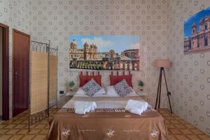 A bed or beds in a room at Casa Caterina