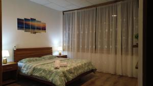 Postel nebo postele na pokoji v ubytování ROOM COLIBRÍ - La Casa de Eros