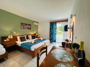 Postel nebo postele na pokoji v ubytování Melitsa corfu hotel