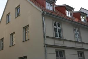 a pipe on the side of a building at Ferienwohnung Kröning in Stralsund