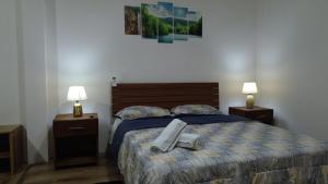 Postel nebo postele na pokoji v ubytování ROOM AYAMPE - La Casa de Eros
