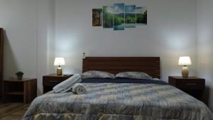 Postel nebo postele na pokoji v ubytování ROOM AYAMPE - La Casa de Eros