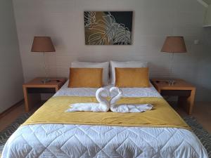 Postel nebo postele na pokoji v ubytování Norverde - Açores