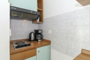 Kuchnia lub aneks kuchenny w obiekcie Aida in Poreč * Istrien