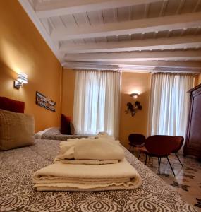 a bedroom with a large bed in a room at Residenza FillAnfi in Lucca
