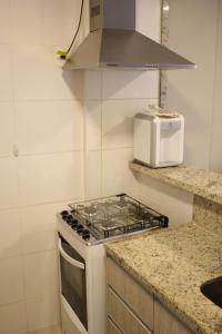 Kuchyň nebo kuchyňský kout v ubytování Noroeste Atrium Platine Apartamento Completo
