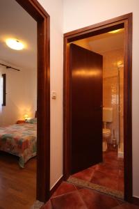 Ένα ή περισσότερα κρεβάτια σε δωμάτιο στο Apartments with parking space Valbandon, Fazana - 7304