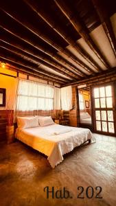 馬里基塔的住宿－Villa Tikuna，一间卧室,卧室内配有一张大床