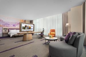 Televiisor ja/või meelelahutuskeskus majutusasutuses Hampton by Hilton Foshan Shunde Beijiao