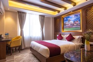 Letto o letti in una camera di Kailash Boutique Hotel