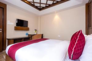 Letto o letti in una camera di Kailash Boutique Hotel