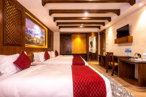 Letto o letti in una camera di Kailash Boutique Hotel